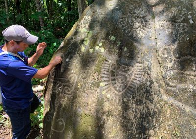 petroglyphic stone visit during ayahuasca retreat in ecuador